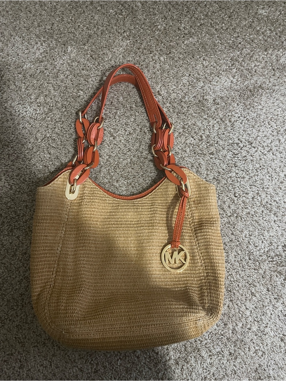 Michael Kors Tan Straw Shoulder Bag with Orange Trim and Gold Charm